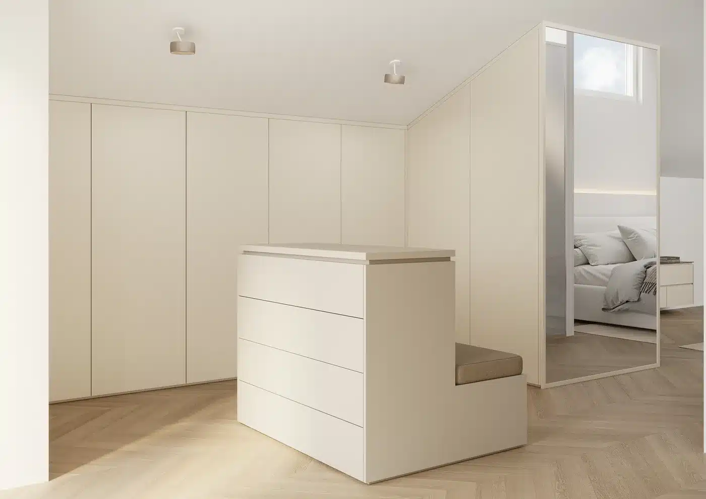 Ankleide unter der Dachschräge mit raumhohen Fronten, Insel mit Schubkästen, Sitzbank und Spiegel zum Schlafzimmer
